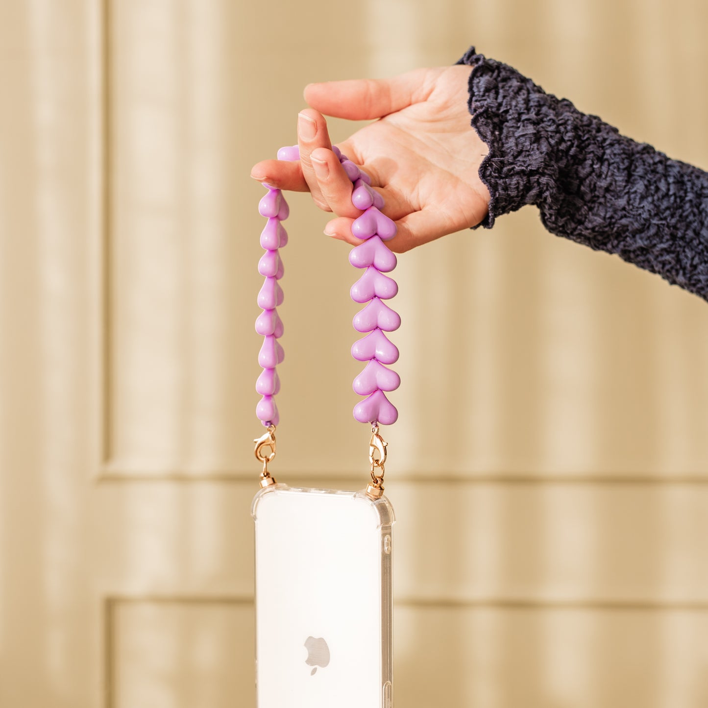 Phone case with purple hearts cord