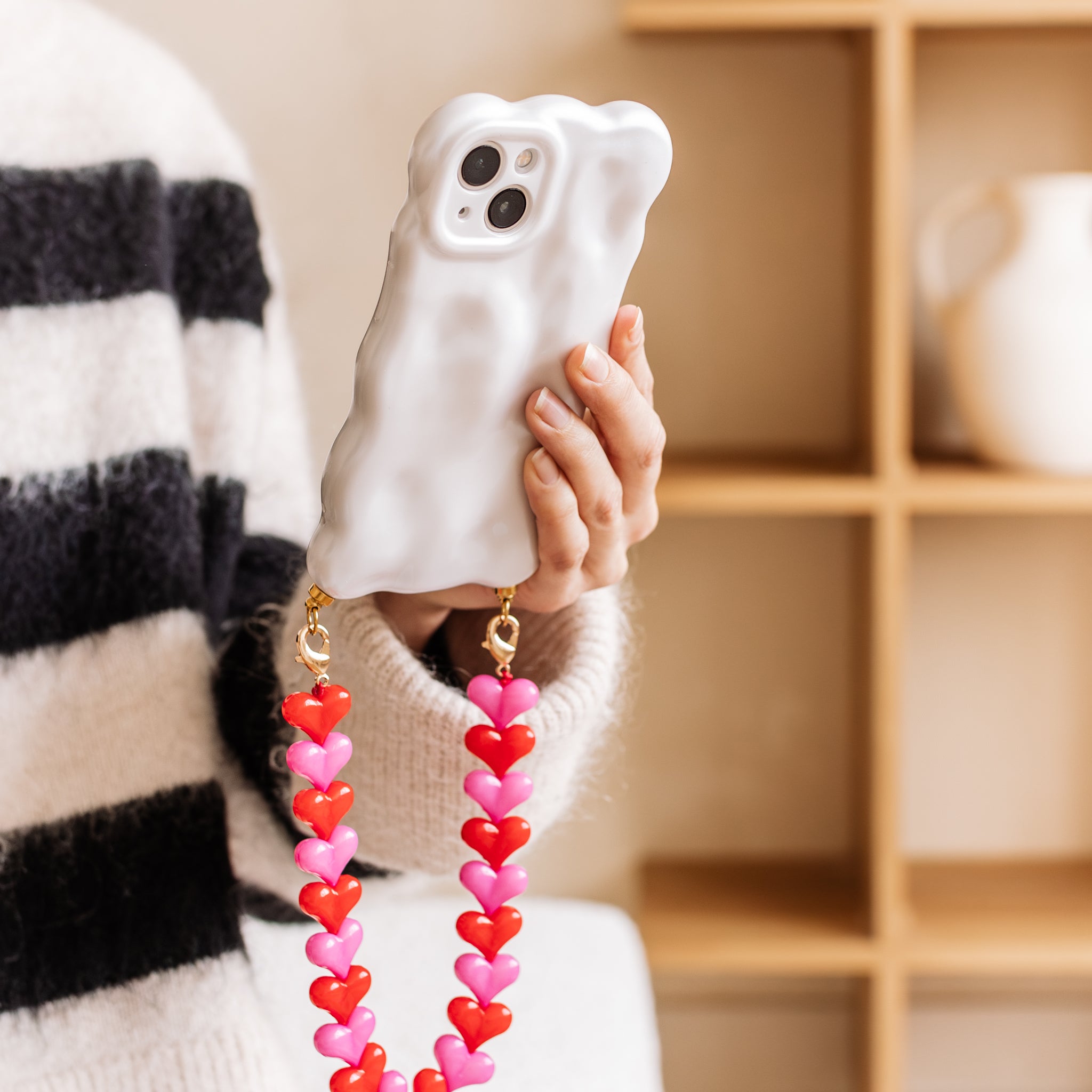 Bubbly white phone case with red & pink hearts cord