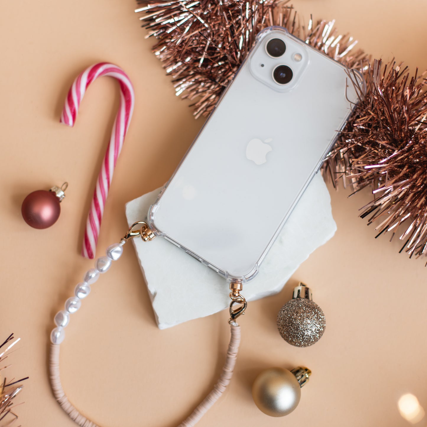 Phone case with nude & pearl cord