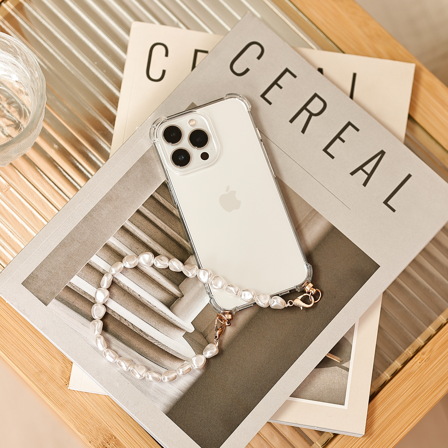 Phone case with pearl cord