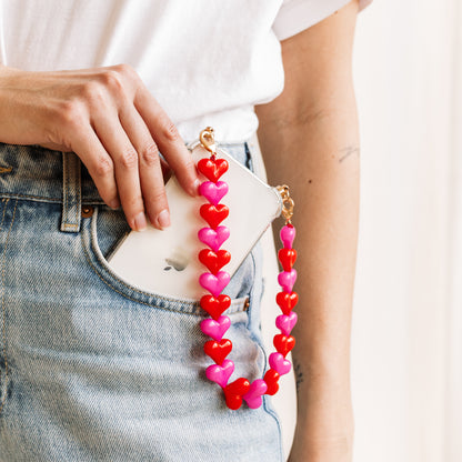 Phone case with red &amp; pink hearts cord