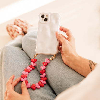 Bubbly white phone case with red &amp; pink hearts cord