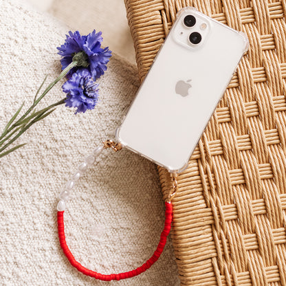 Phone case with red &amp; pearl cord