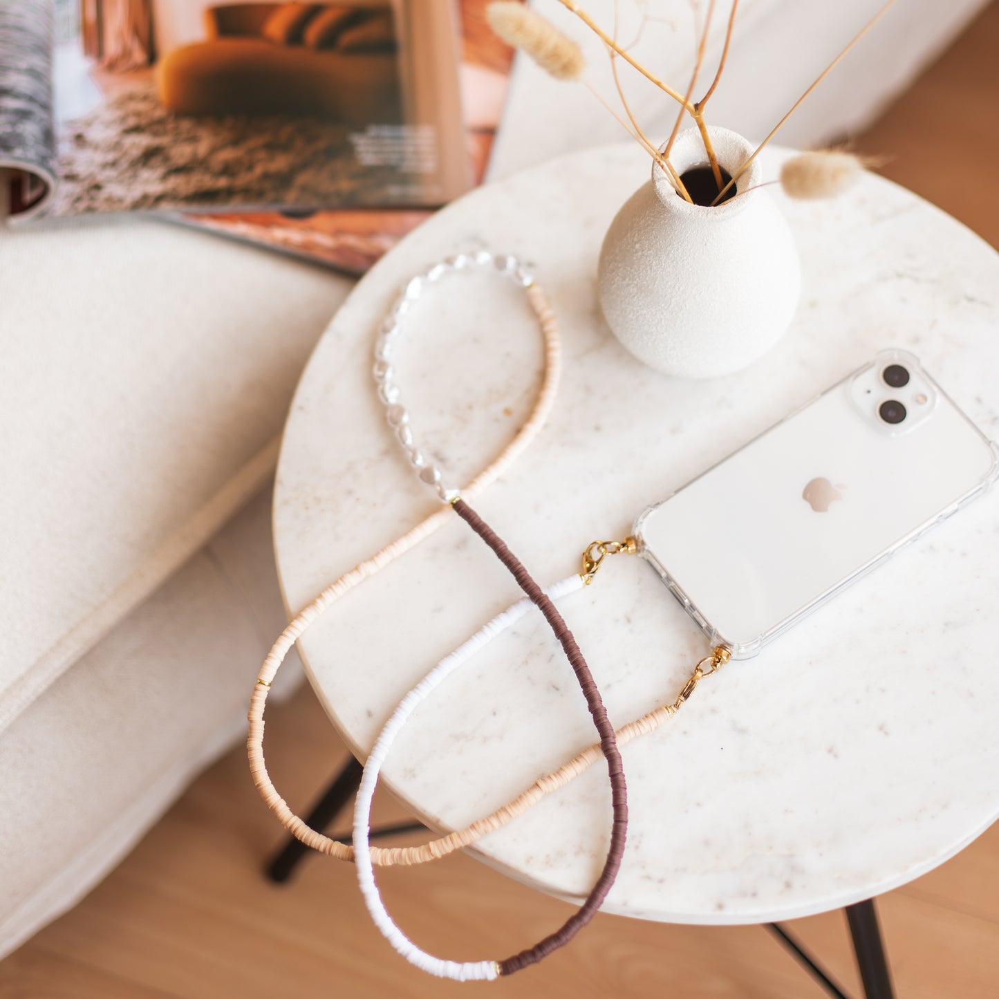 Phone case with long and short cozy cord