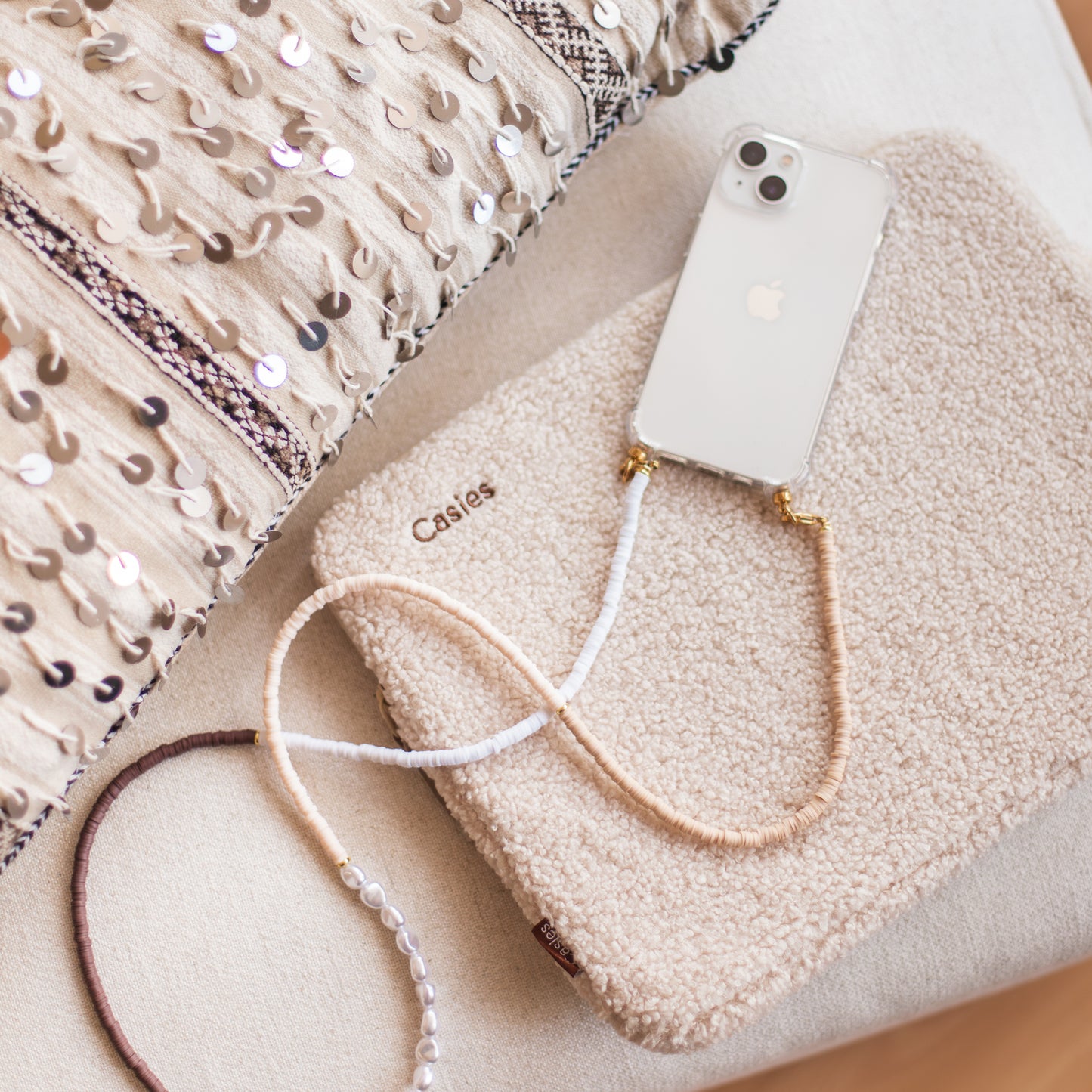Phone case with long and short cozy cord
