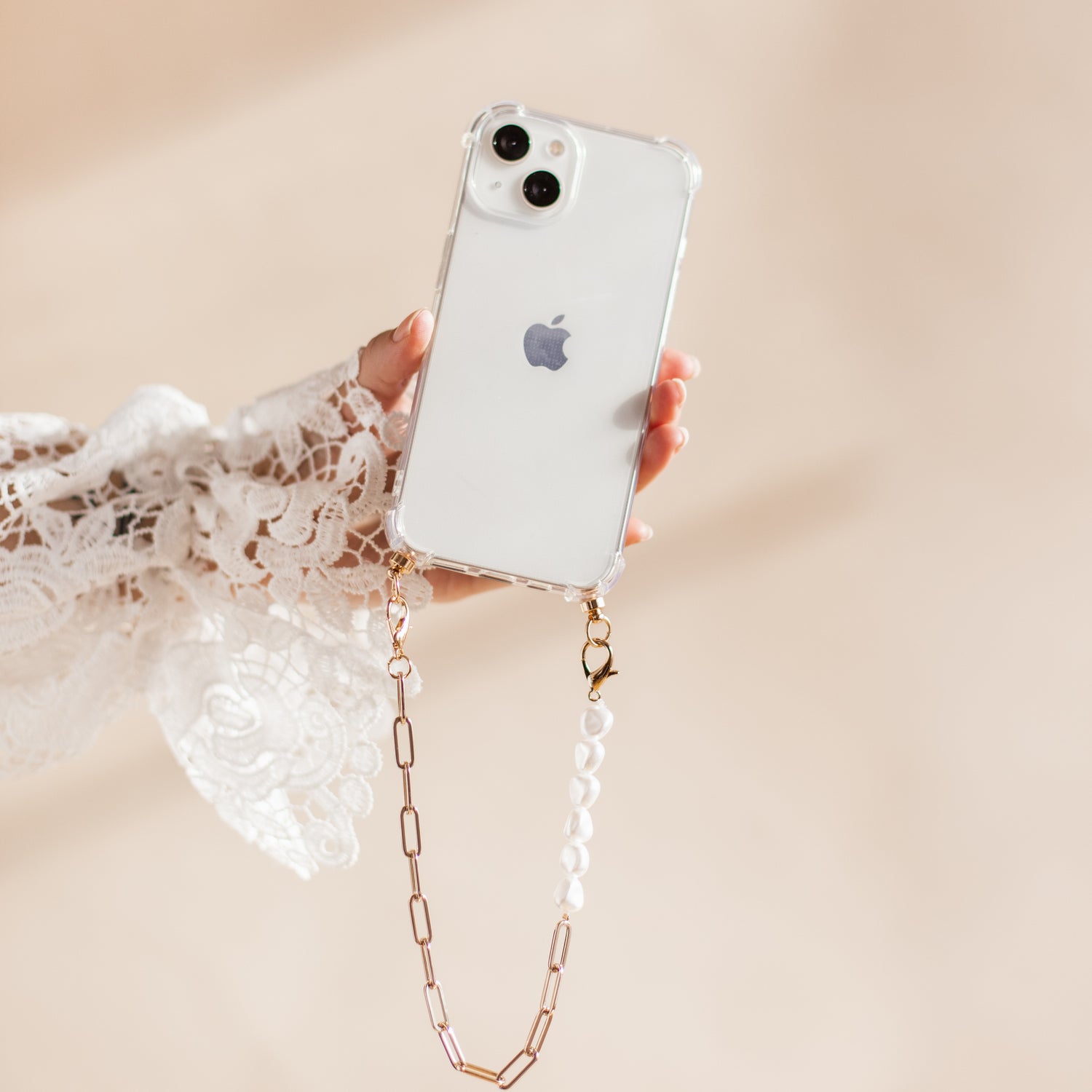 Phone case with gold &amp; pearl cord